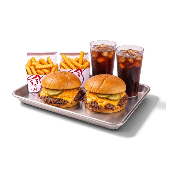 Menu Duo : deux burgers, deux frites, deux boissons sur un plateau