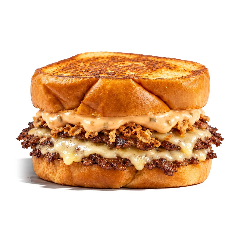 Burger The Melt : brioche au beurre, sauce secrète maison, oignons frits, double steak et emmental