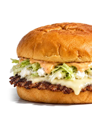 The Golden Goat, smash burger de Woody's Factory : sauce moutarde-miel, chèvre, salade, steak smashé et emmental